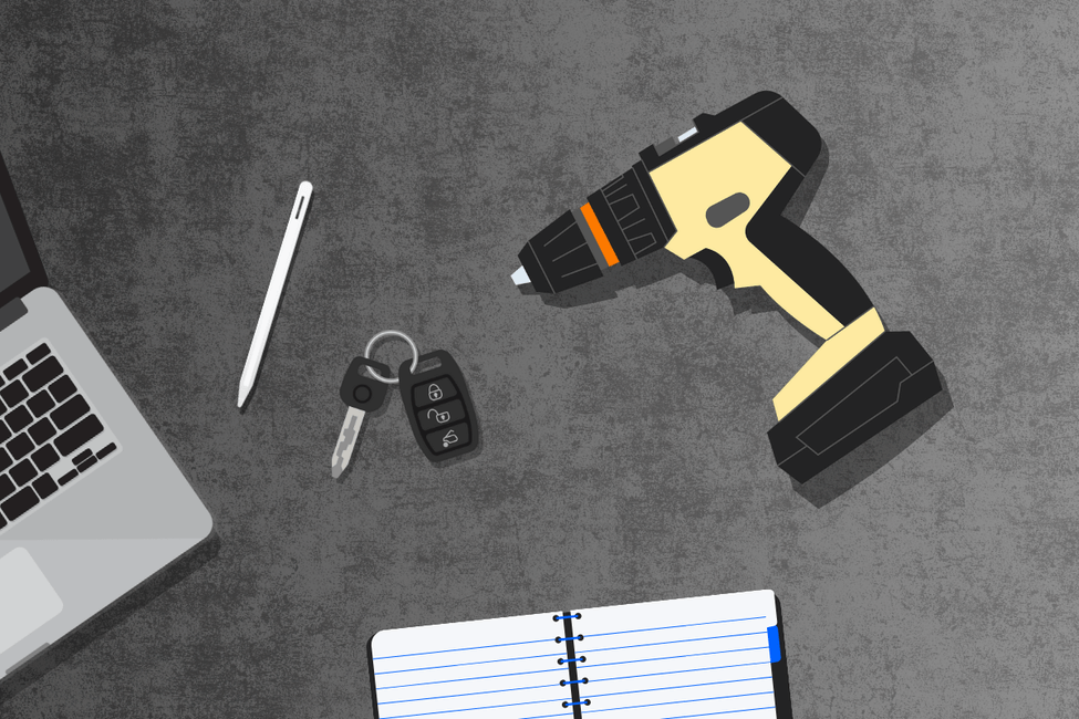 Business assets on a desk representing fixed assets you can assign and manage